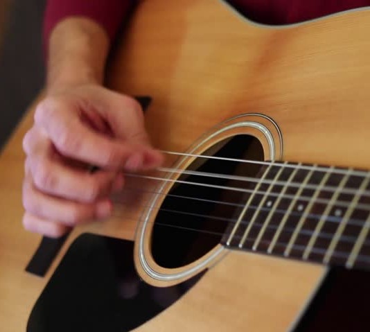 songwriter guitar player small hands life